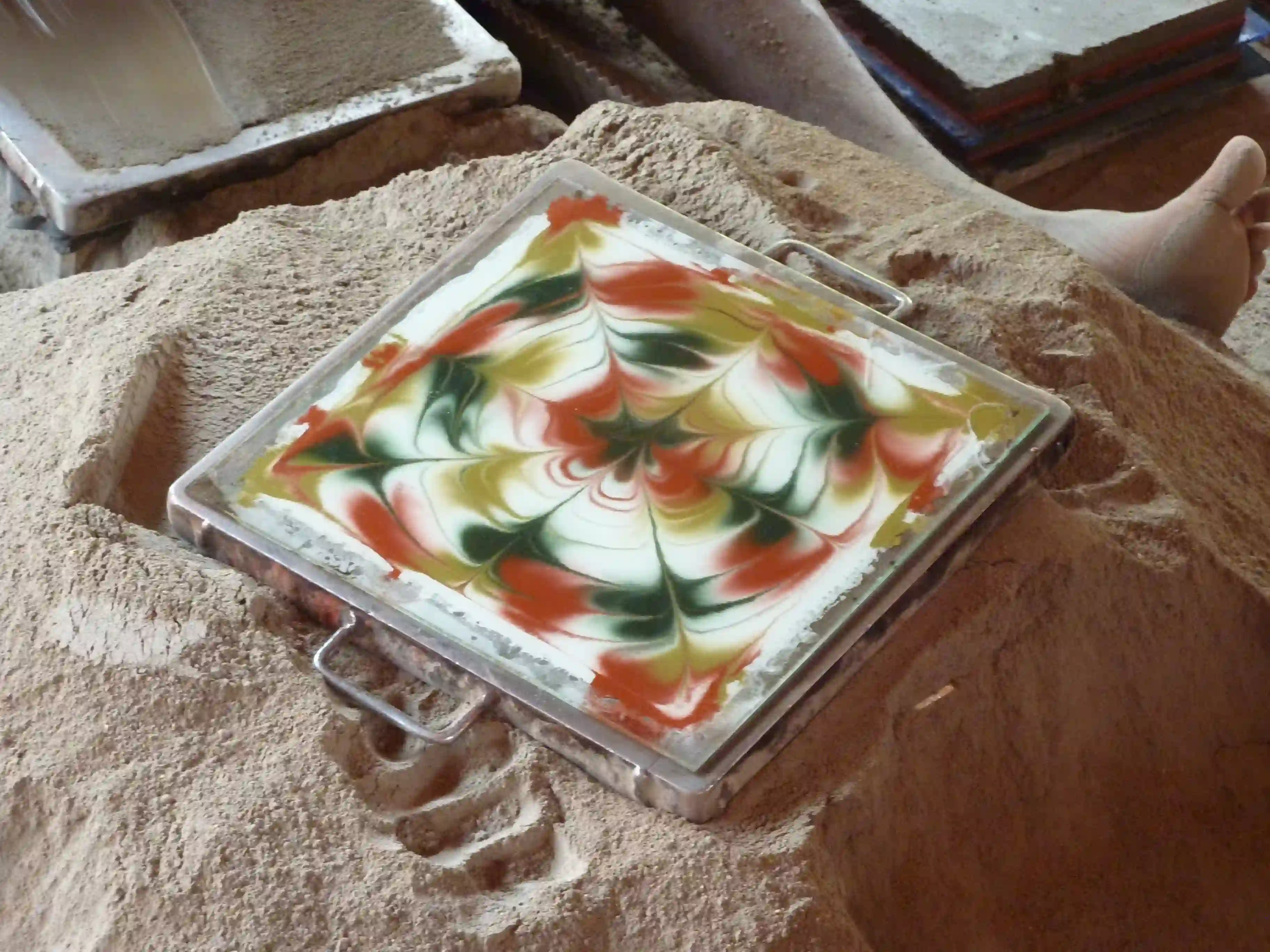 Artisan making traditional Athangudi tiles in Chettinad